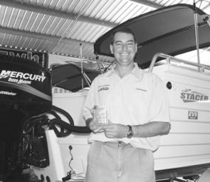 Jason Disson from Disco Marine in Grafton has won the 2005 Stacer NSW Customer Service Excellence Award .